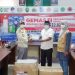 Sukseskan GEMAS Tahap 2, Kasatpol PP dan WH Aceh Serahkan Logistik Masker ke Sekdako Langsa.