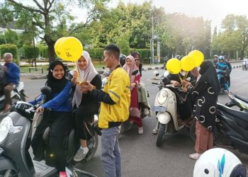 Maxim Bagikan Takjil Gratis di Kota Banda Aceh