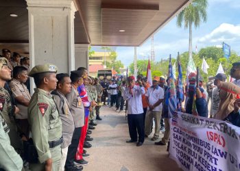 Polisi Bersama Satpol PP – WH Aceh Amankan Peringatan Hari Buruh Nasional di Aceh