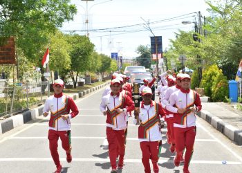 Nasir, Legenda Marathon Pidie, Pembawa Obor PON XXI di Kota Mulieng