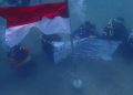 HUT Ke-81 RI, Polairud Polda Aceh Kibarkan Bendera Merah Putih di Dasar Laut Krueng Raya